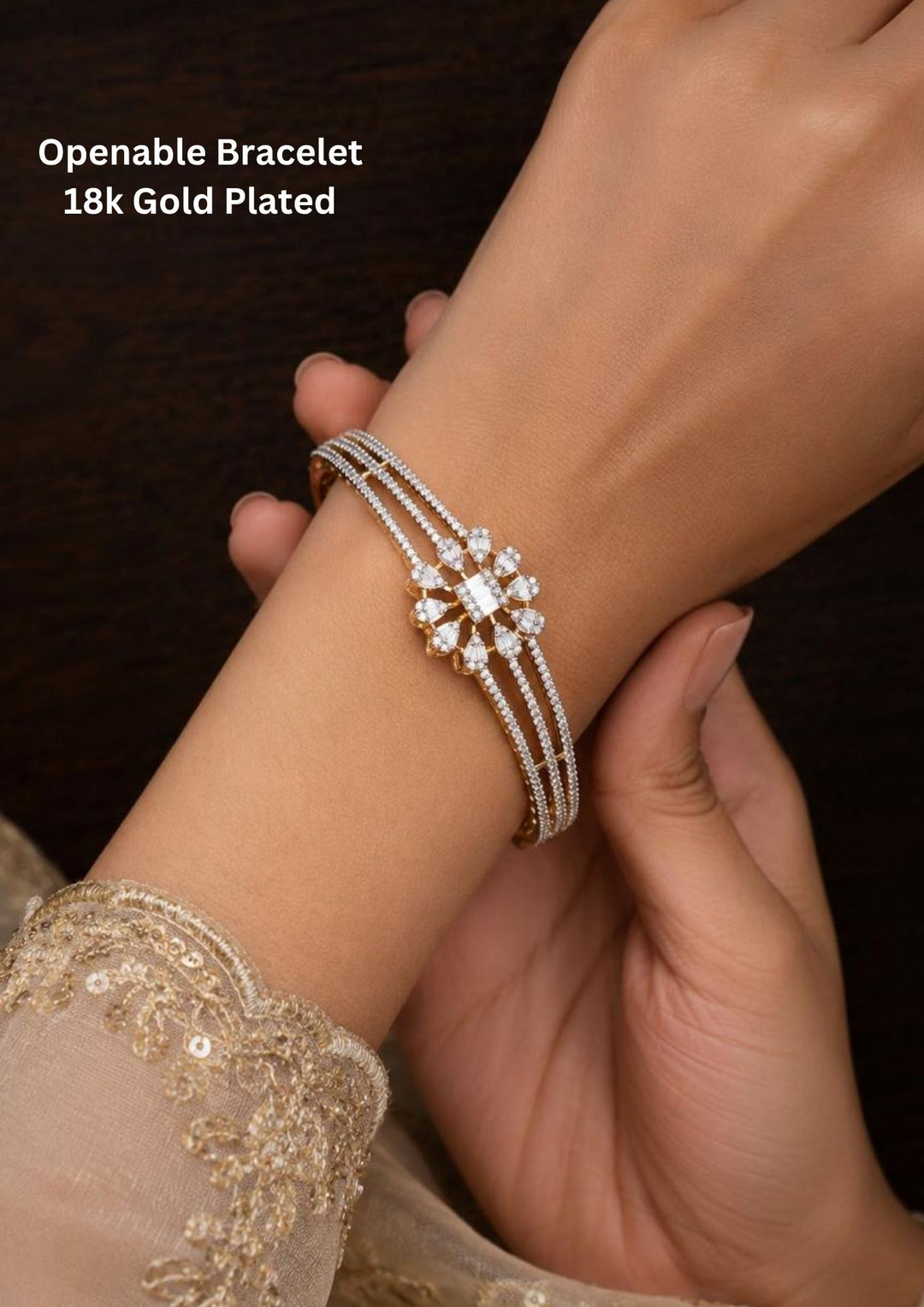 South Indian women wearing openable zircon diamond 18K gold plated bracelet designed with shimmering white zircon stones, floral diamond pattern and elegant gold finish that gives a graceful traditional and modern look for weddings, festive occasions, poojas, office styling, family functions and daily fashion wear.