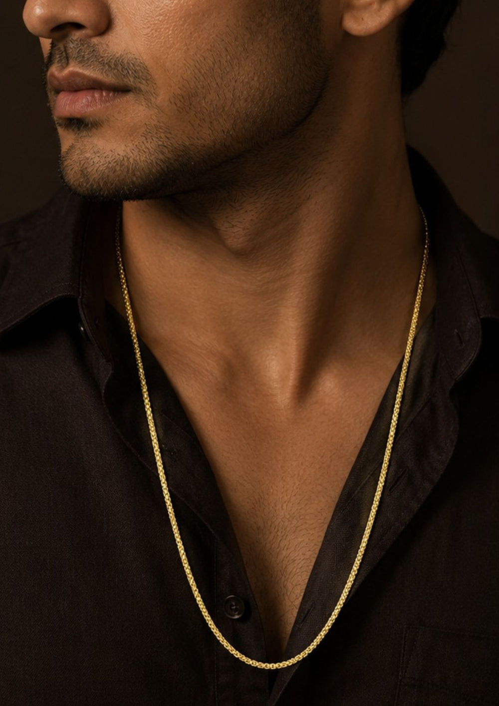 Close up of a South indian men wearing a Premium 18K gold plated men's rope chain featuring a tightly woven design with a polished finish. Lightweight yet durable, making it perfect for everyday wear or pairing with pendants.