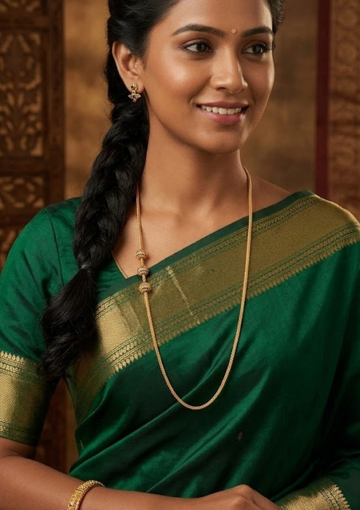 South Indian woman wearing a Thaali Chain 18K Gold Plated long chain with a twisted chain design with traditional gold-plated side beads, good finish, lightweight, sweat proof, anti-fade colour, skin-friendly quality, and perfect for daily wear, functions, festivals, and weddings.