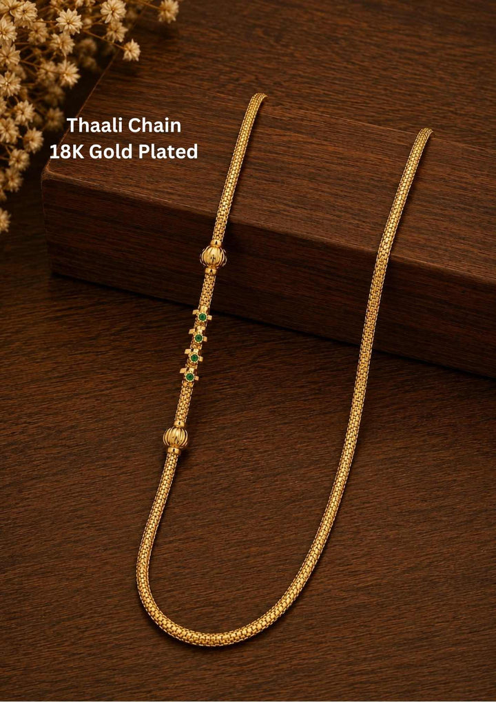 18K gold-plated emerald thali chain with ball shape comes with ball shape and shown very clearly and it is tradition for Indian women and can use for dailyware , office ware and functional 