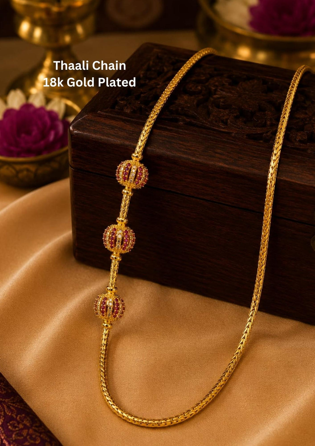 18K gold plated thalli chain featuring beautifully crafted ruby designer bead accents with an elegant woven chain. Perfect for festive occasions and daily elegance.