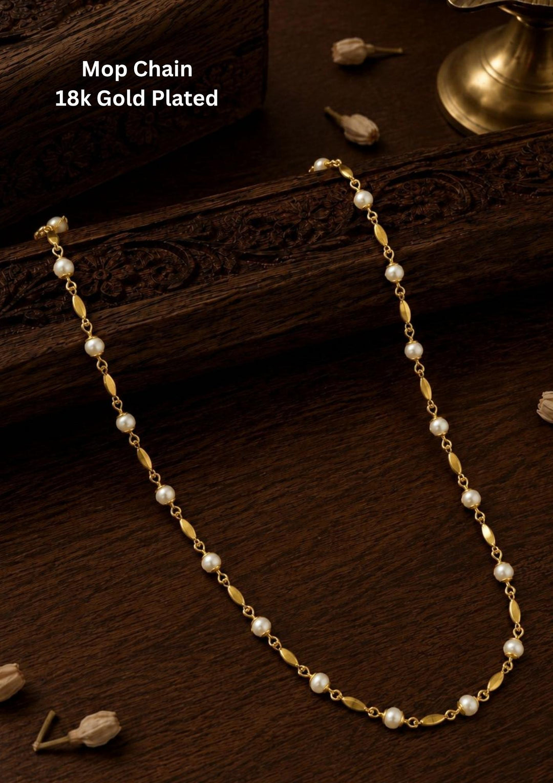 Gold-plated mop chain necklace design with pearl in between the chain and can be used for daily ware and office ware .