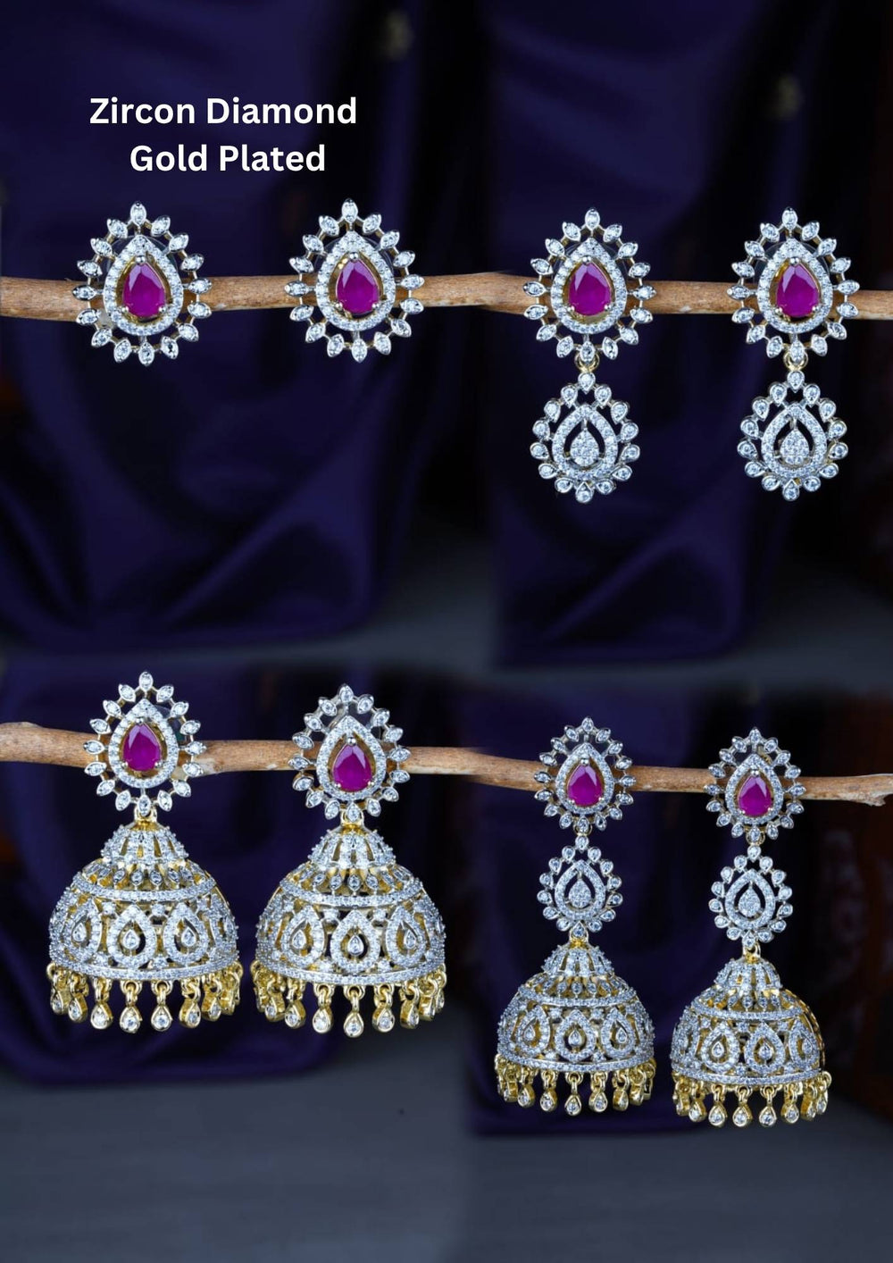 A premium collection of four distinct pairs of gold-plated earrings featuring brilliant white zircon diamonds and vibrant teardrop-shaped emerald pink stones. The assortment includes elegant halo stud earrings, multi-tiered crystal drops, and classic South Indian style hanging jhumkas adorned with intricate stone settings and tiny dangling gold beads, all beautifully arranged on a rustic branch against a deep purple fabric backdrop.