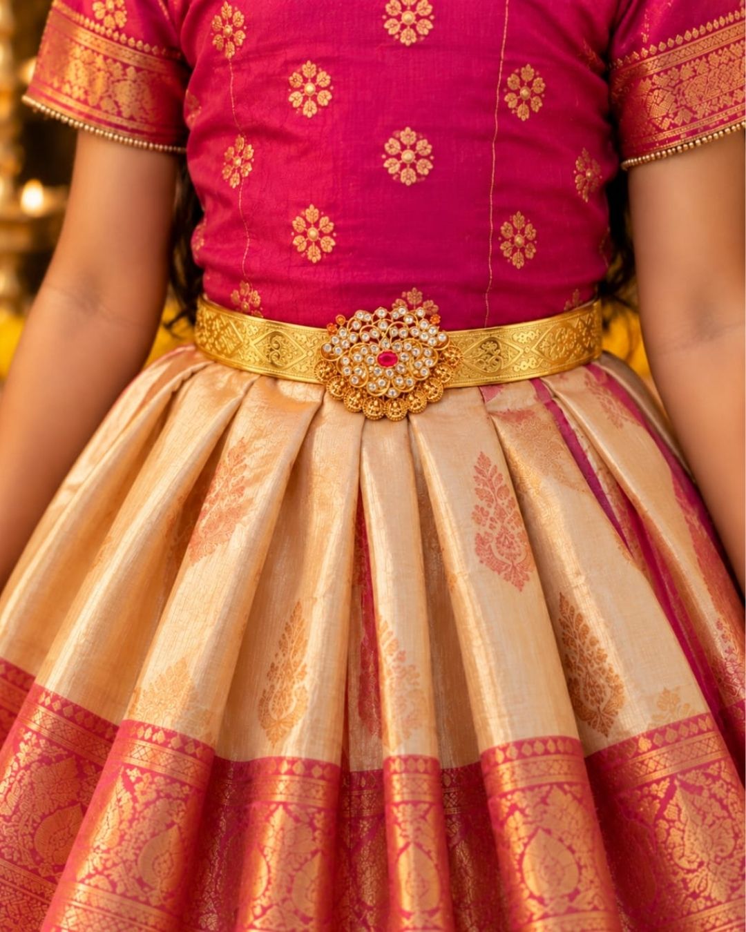 Elegant gold plated vaddanam with a floral crystal centerpiece and intricate detailing for festive and traditional wear.