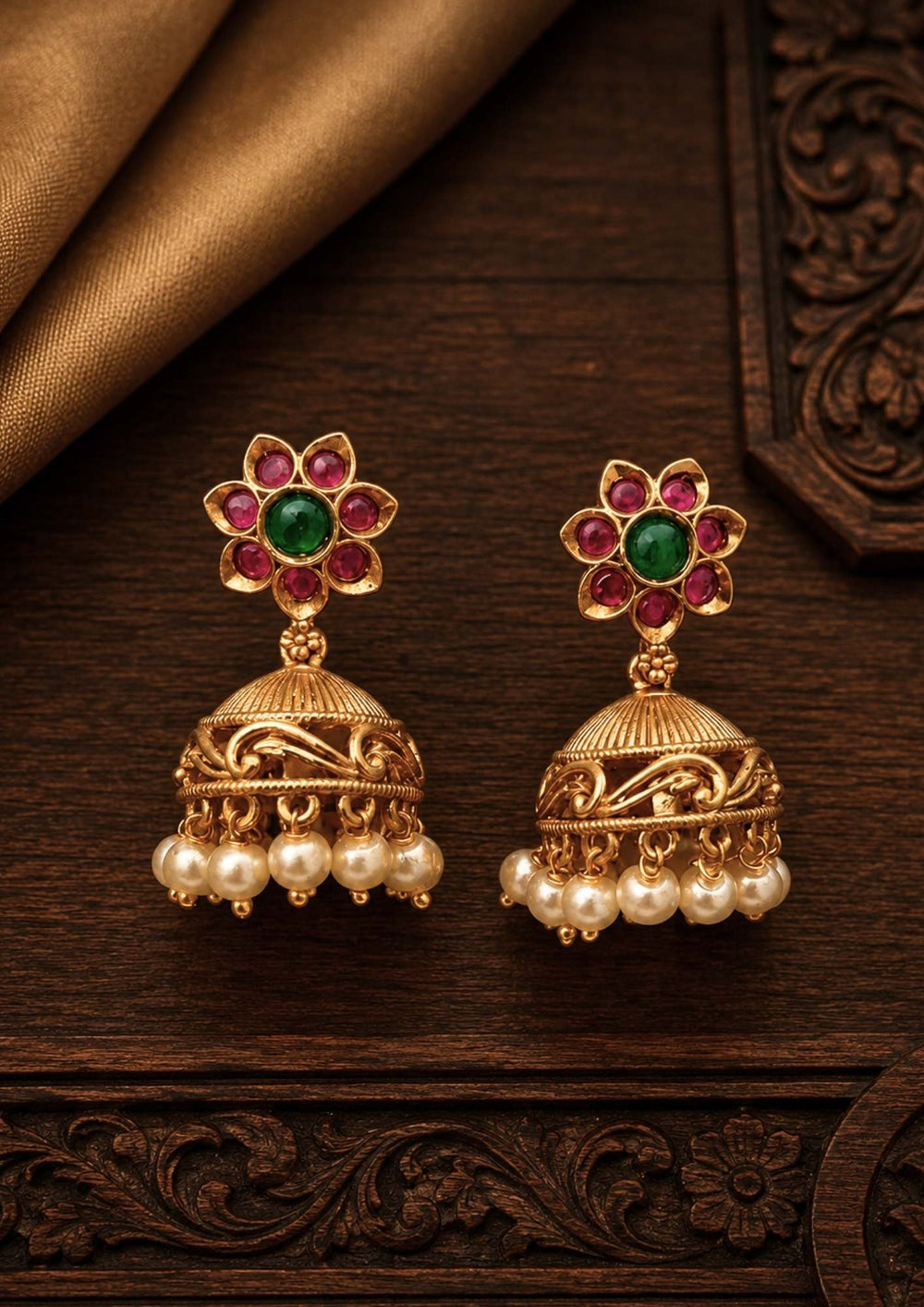 Gold earrings with floral design and pearl drops 