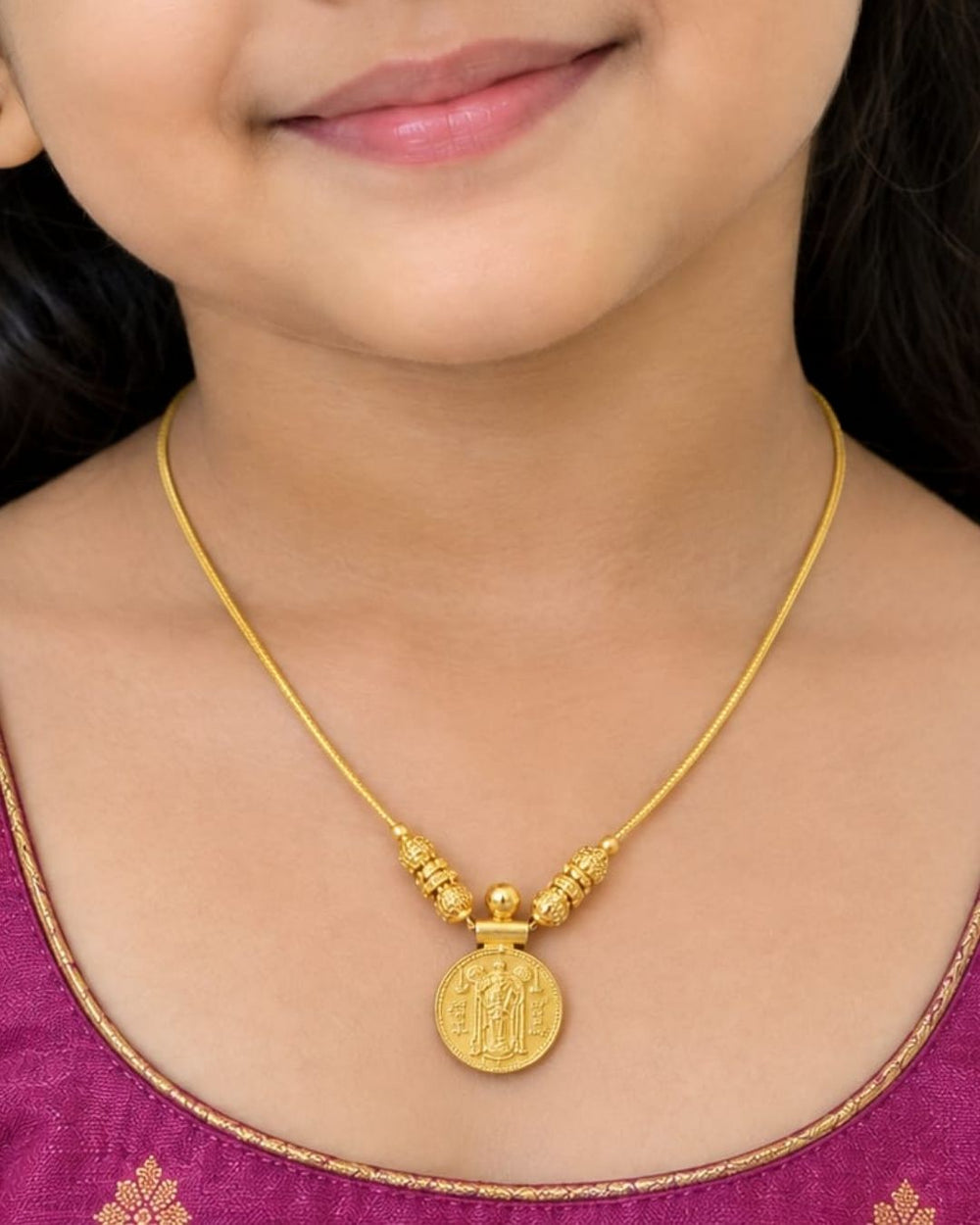 Exquisite God Balaji gold-plated coin necklace featuring intricate motif carvings and ruby-colored stone accents. Ideal for weddings, festive occasions, temple visits, traditional sarees, and bridal gifting.