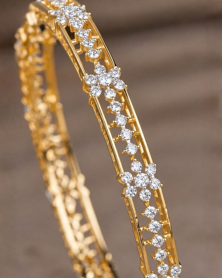 Elegant 18K gold plated zircon diamond bangles crafted with brilliant floral crystal detailing for festive and party wear.