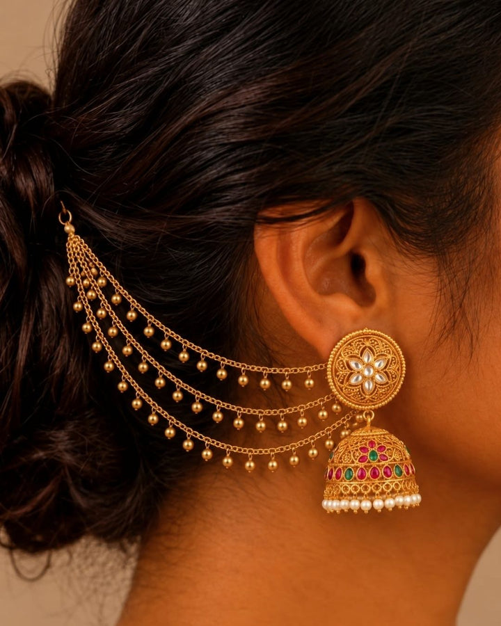 Elegant gold plated multi-layer waist chain featuring delicate dangling beads, designed to complement sarees, lehengas, and bridal attire.