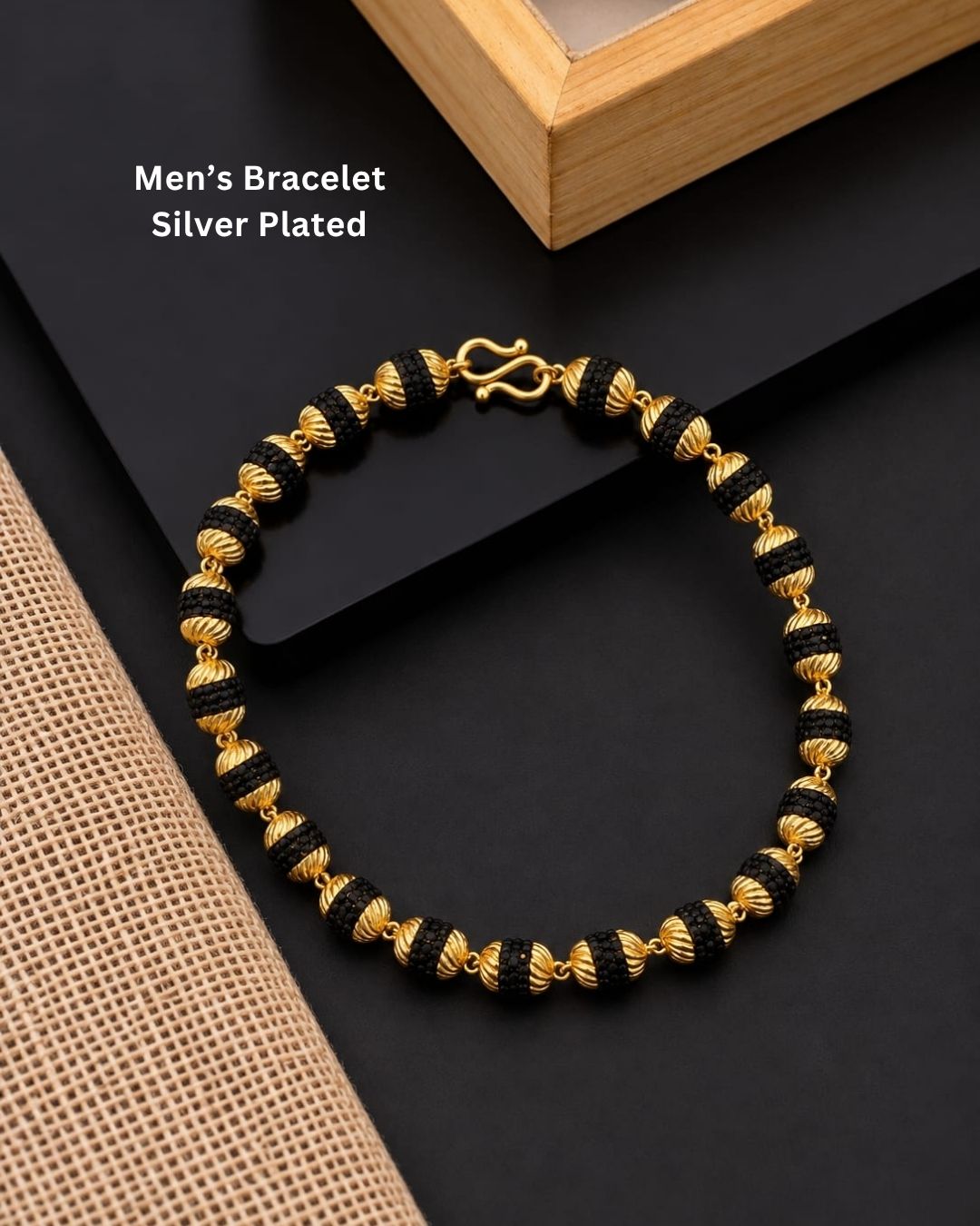 Elegant gold plated men’s bracelet featuring alternating black textured beads, ornate gold bead detailing, and a secure hook clasp, perfect for daily wear, festive occasions, and traditional looks.