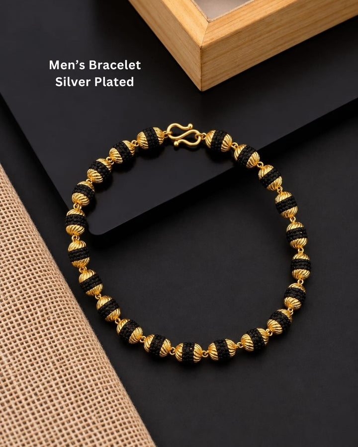 Elegant gold plated men’s bracelet featuring alternating black textured beads, ornate gold bead detailing, and a secure hook clasp, perfect for daily wear, festive occasions, and traditional looks.