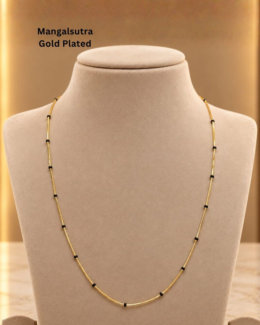 Beautiful Mangalsutra featuring a delicate gold plated chain with traditional black beads arranged along the chain. Perfect for daily wear, office wear, traditional outfits, festive occasions, and gifting.