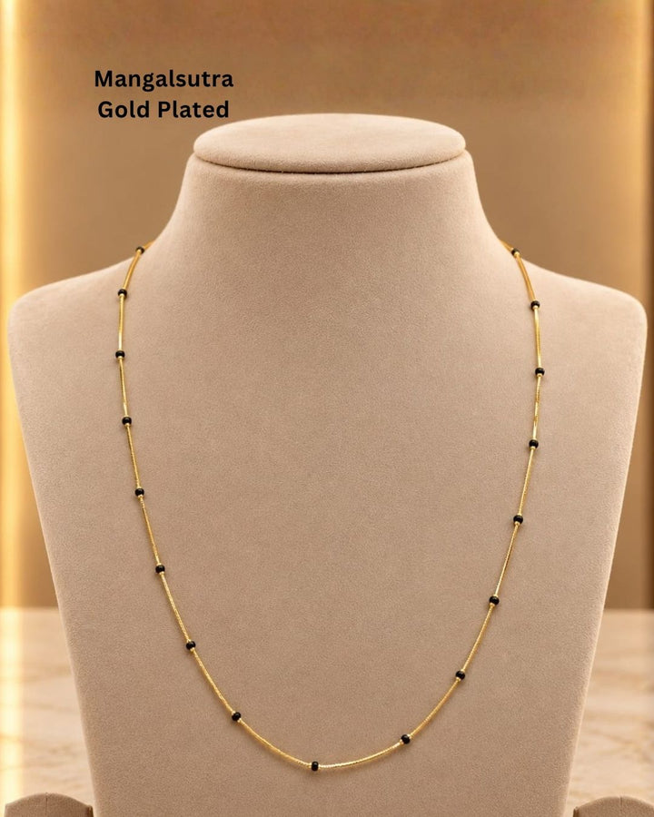 Beautiful Mangalsutra featuring a delicate gold plated chain with traditional black beads arranged along the chain. Perfect for daily wear, office wear, traditional outfits, festive occasions, and gifting.