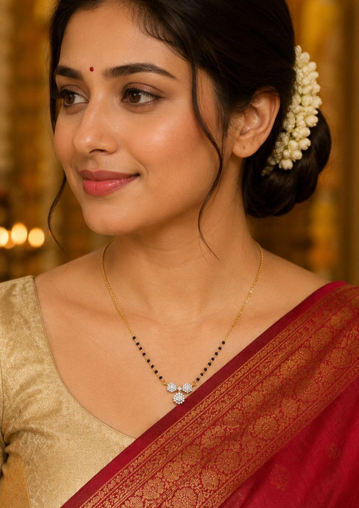 South Indian Woman wearing a 18k Gold Plated Zircoin Diamond mangalsutra ideal for dailywear  skin friendly anti fade color
