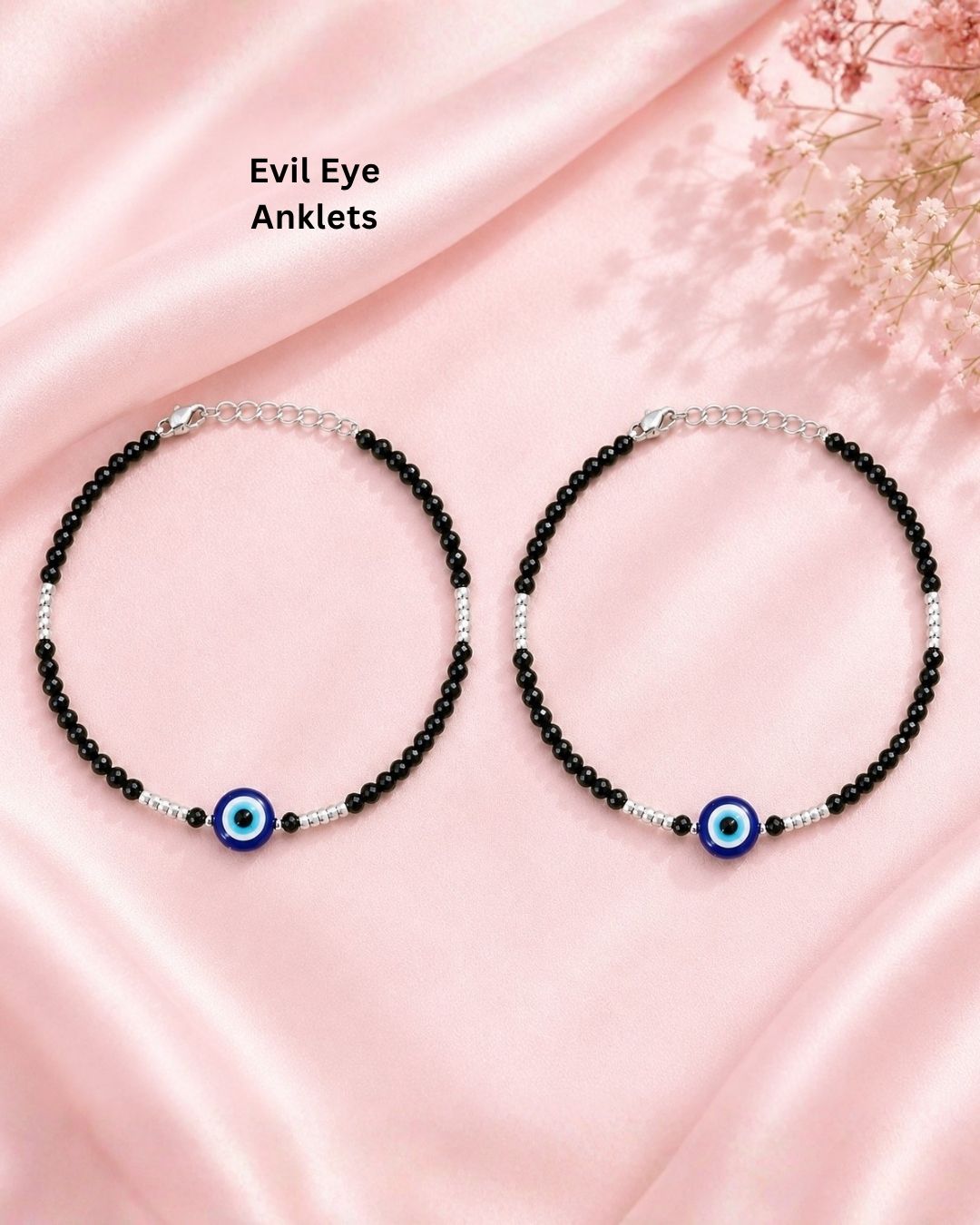 Beautiful set of two black beaded evil eye bracelets featuring faceted black beads, silver bead accents, and blue evil eye centerpiece charms. Perfect for daily wear, casual outfits, gifting, and stylish occasions.