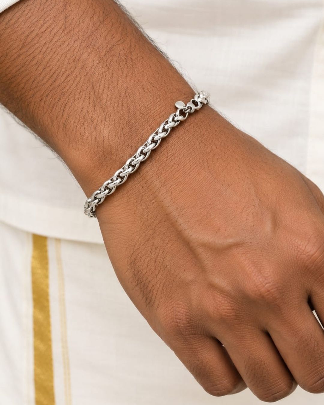 Elegant silver plated men’s bracelet featuring an intricate braided chain design, polished finish, and secure lobster clasp, perfect for daily wear, casual outfits, and modern looks.