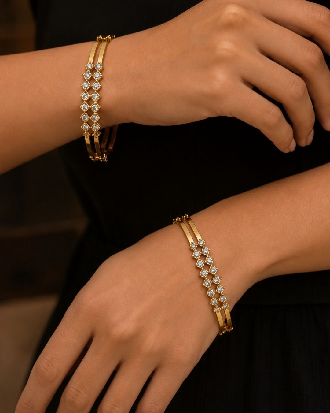 Traditional gold plated bangle and jhumka earrings set featuring CZ stones, green gemstones, pink accents, pearl hangings, and a luxurious velvet presentation for festive occasions.