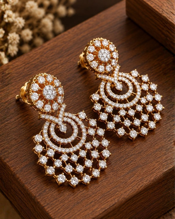 south Indian Woman wearing a chandbali earrings looking very shine and can see how women can look if we wear this earrings can be  used for functional ware, weeding , and can gift 