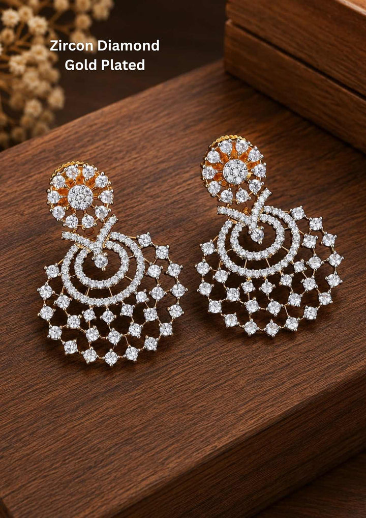 gold Plated  chandbali earrings its a light weight earrings and comes with zircon diamond and in image shows very clear  earrings and they are very shine can use for festivals ,weeding's, and can gift 