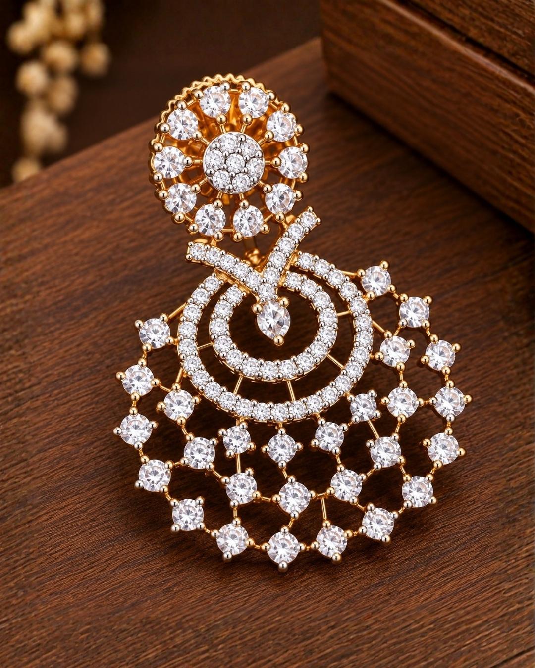 south Indian Woman wearing a chandbali earrings looking very shine and can see how women can look if we wear this earrings can be  used for functional ware, weeding , and can gift 