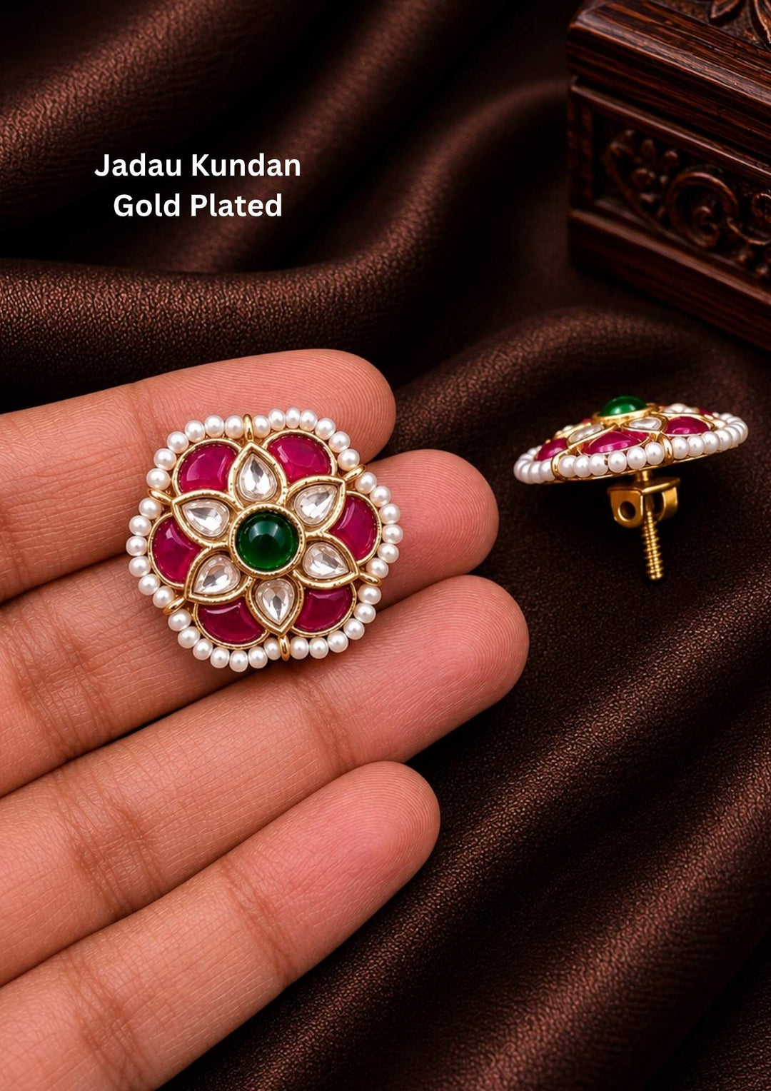 Gold plated small stud earrings featuring a classic round shape beautifully set with a clear, shimmering white Jadau Kundan stone at the center. The central gemstone is enclosed by a fine, highly detailed gold filigree border with tiny textured dots, providing a neat, simple traditional look suitable for daily styling, office wear, and small family functions.