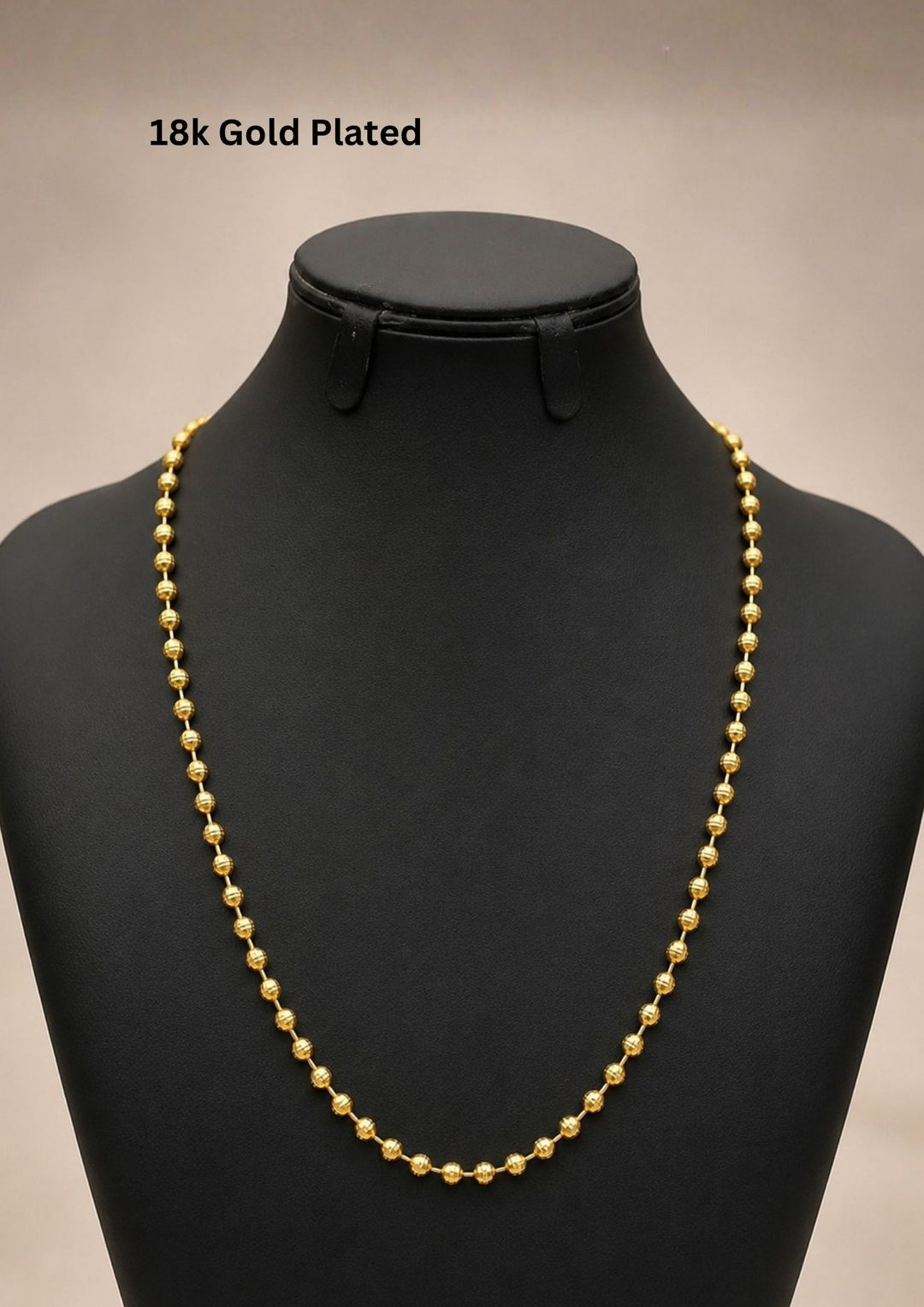 Beautiful gold plated beaded chain featuring textured round beads and a polished finish. Perfect for daily wear, festive occasions, layering, traditional outfits, and premium gifting.