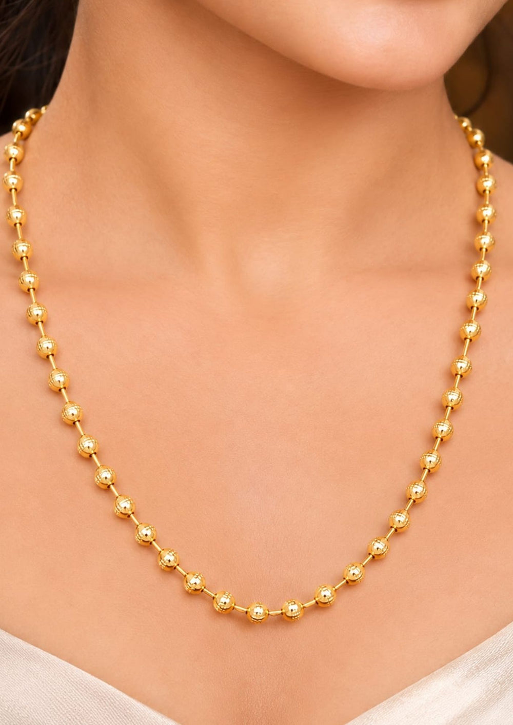 South induan women's Beautiful gold plated beaded chain featuring textured round beads and a polished finish. Perfect for daily wear, festive occasions, layering, traditional outfits, and premium gifting.