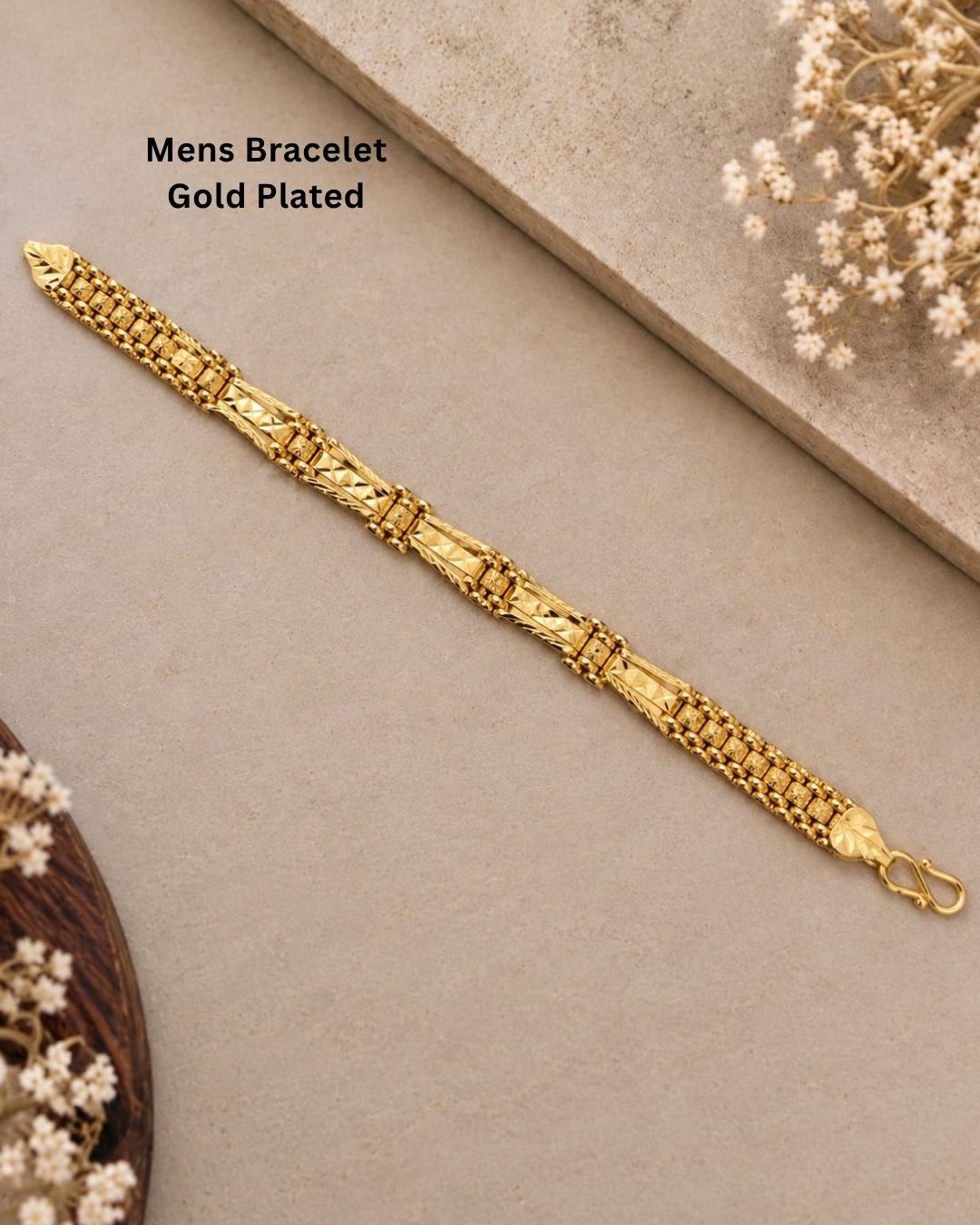 Elegant gold plated men’s designer bracelet featuring detailed rectangular links, geometric patterns, and a classic polished finish, perfect for traditional and modern wear.