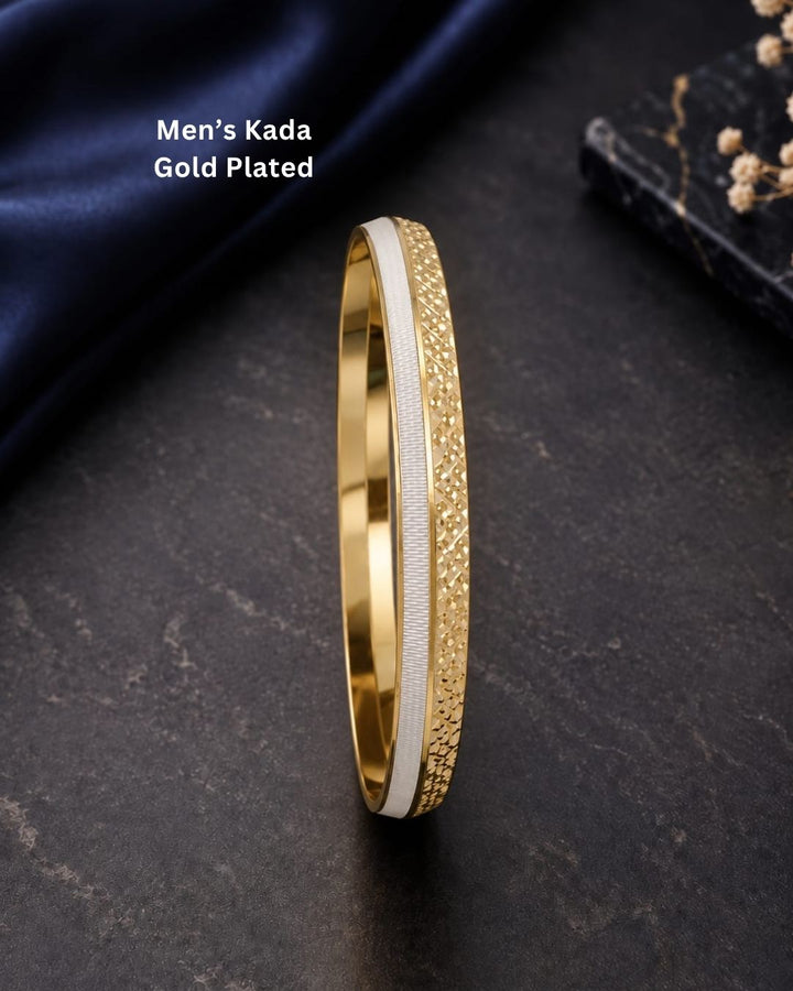 Elegant gold plated men’s kada featuring a sleek dual-tone design, intricate textured detailing along the outer band, and a contrasting silver-tone center strip, perfect for daily wear, festive occasions, parties, and modern looks.