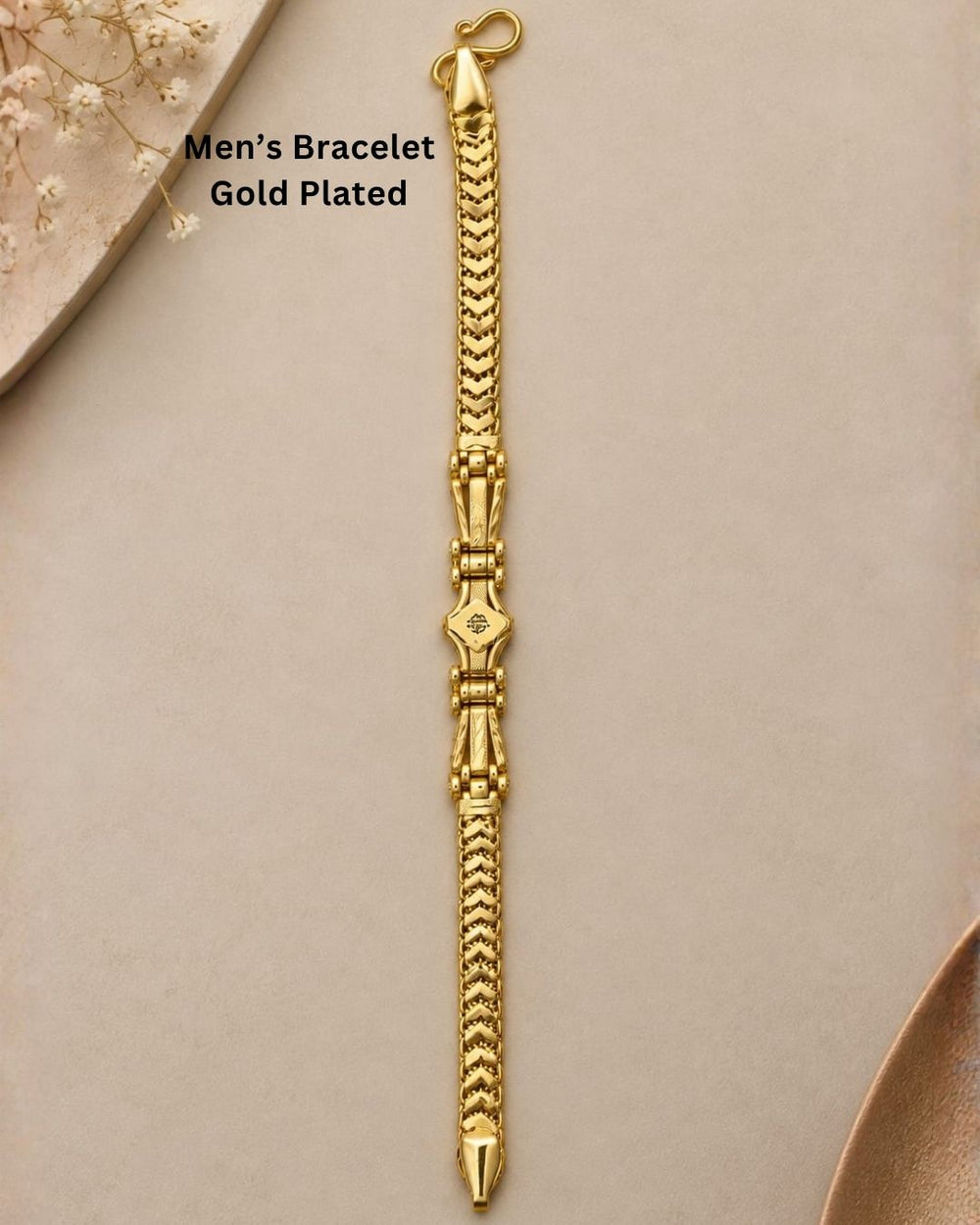 Premium gold plated men’s bracelet with a distinctive chevron link design and detailed central accent, suitable for everyday wear, parties, festive occasions, and gifting.