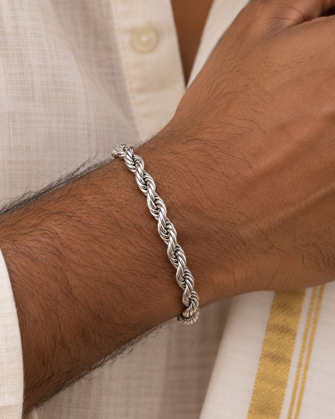 Stylish silver plated men’s bracelet featuring an intricately twisted rope chain design, polished finish, and secure lobster clasp, perfect for daily wear, casual outfits, and modern styling.