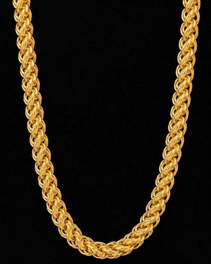A close-up of a man wearing a thick, shiny gold rope chain necklace perfect for daily wear and come with anti tarnish color
