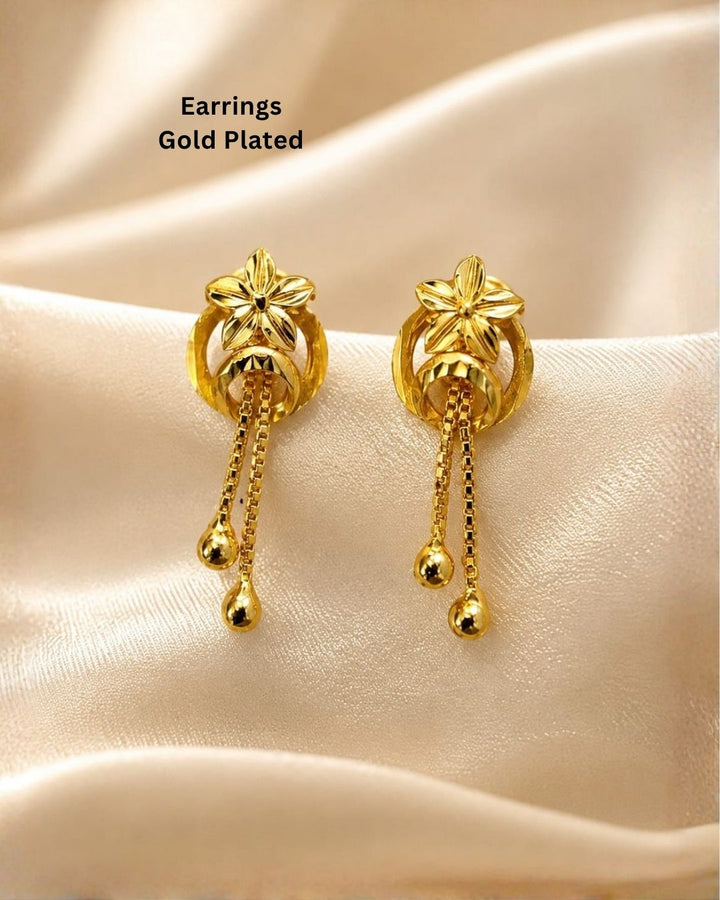 Stylish gold plated floral drop earrings featuring a detailed flower motif, elegant circular design, delicate hanging chains, and polished gold ball drops. Perfect for everyday wear, festive occasions, traditional outfits, parties, and special events.