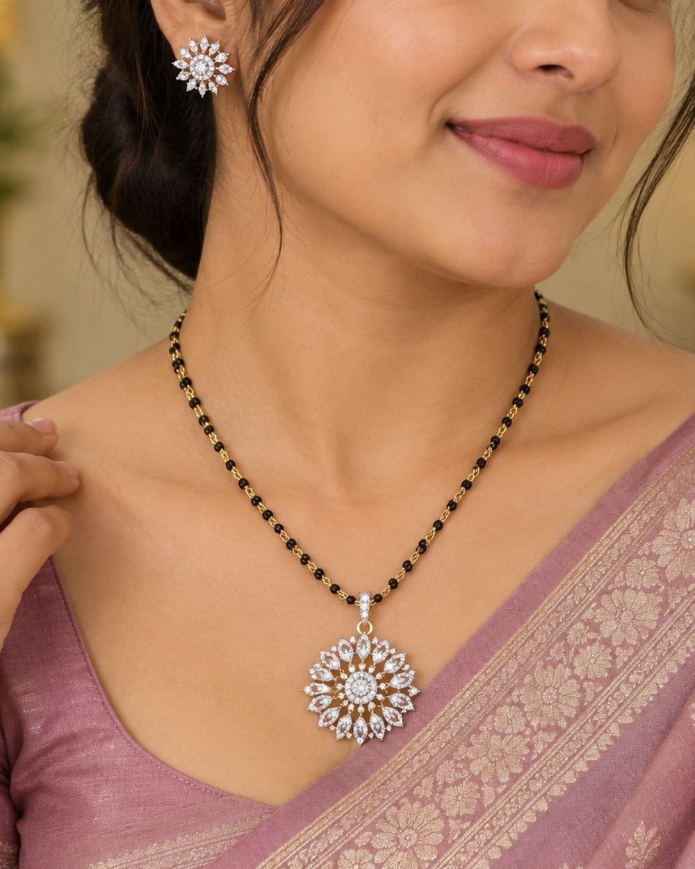 Gold-plated mangalsutra with floral pendants
