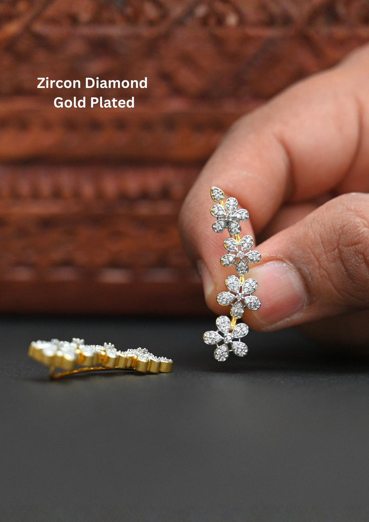 Floral zircon diamond gold plated earrings featuring sparkling white zircon stones arranged in elegant flower petal design with premium gold plated finish and stylish diamond look detailing. These lightweight earrings are crafted with pear cut zircon stones that provide a rich and classy appearance suitable for daily wear, office wear, weddings, festivals, parties, family gatherings, sarees, kurtis, lehengas and western outfits with skin friendly quality, anti fade polish, comfortable fitting and Cash on De