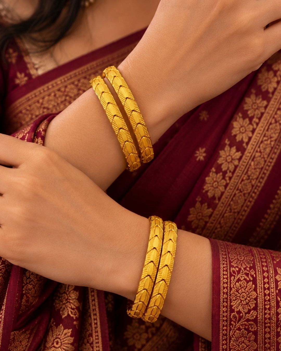 Traditional gold plated women’s bangles featuring a beautiful repeating leaf design with intricate textured detailing, perfect for festive, wedding, and everyday traditional wear.