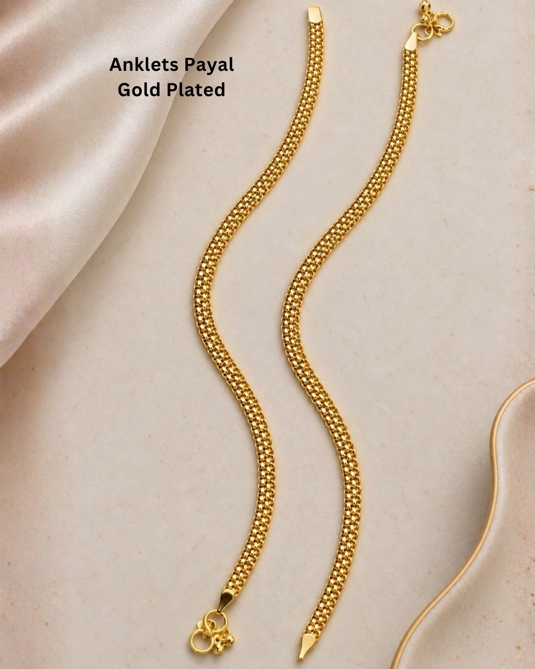 Beautiful gold plated payals featuring a detailed mesh chain design with delicate traditional bell charms and secure clasp detailing. Perfect for traditional wear, festive occasions, weddings, daily wear, and gifting.
