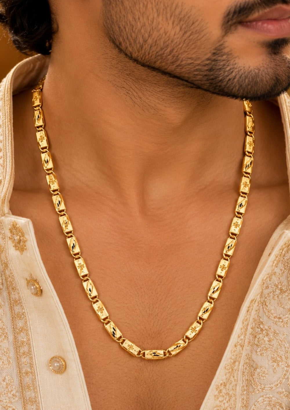 Premium gold plated men’s chain with detailed floral engraved links and a refined polished finish, suitable for everyday wear, festive occasions, parties, special events, and gifting.