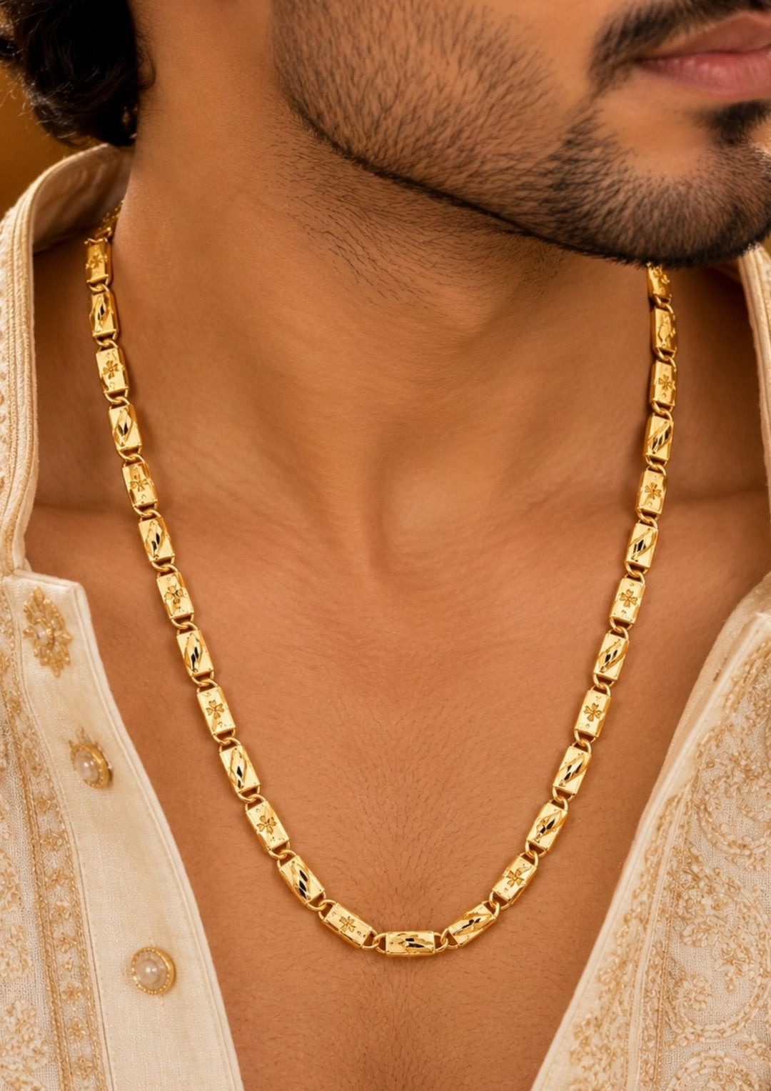 Premium gold plated men’s chain with detailed floral engraved links and a refined polished finish, suitable for everyday wear, festive occasions, parties, special events, and gifting.