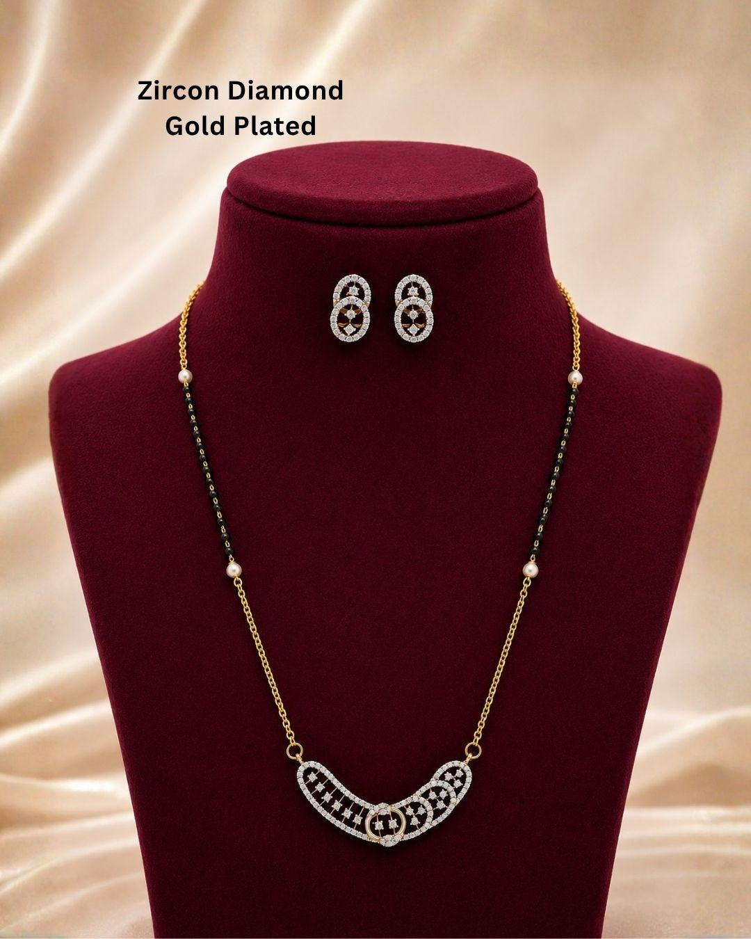 Beautiful black beads gold plated necklace set featuring a unique curved pendant embellished with sparkling stones and matching oval earrings, perfect for daily wear, festive occasions, parties, and gifting.