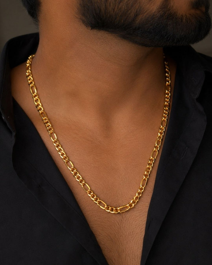 Elegant 18K gold plated Figaro chain for men showcasing alternating oval and round links, perfect for casual, festive, and formal occasions.