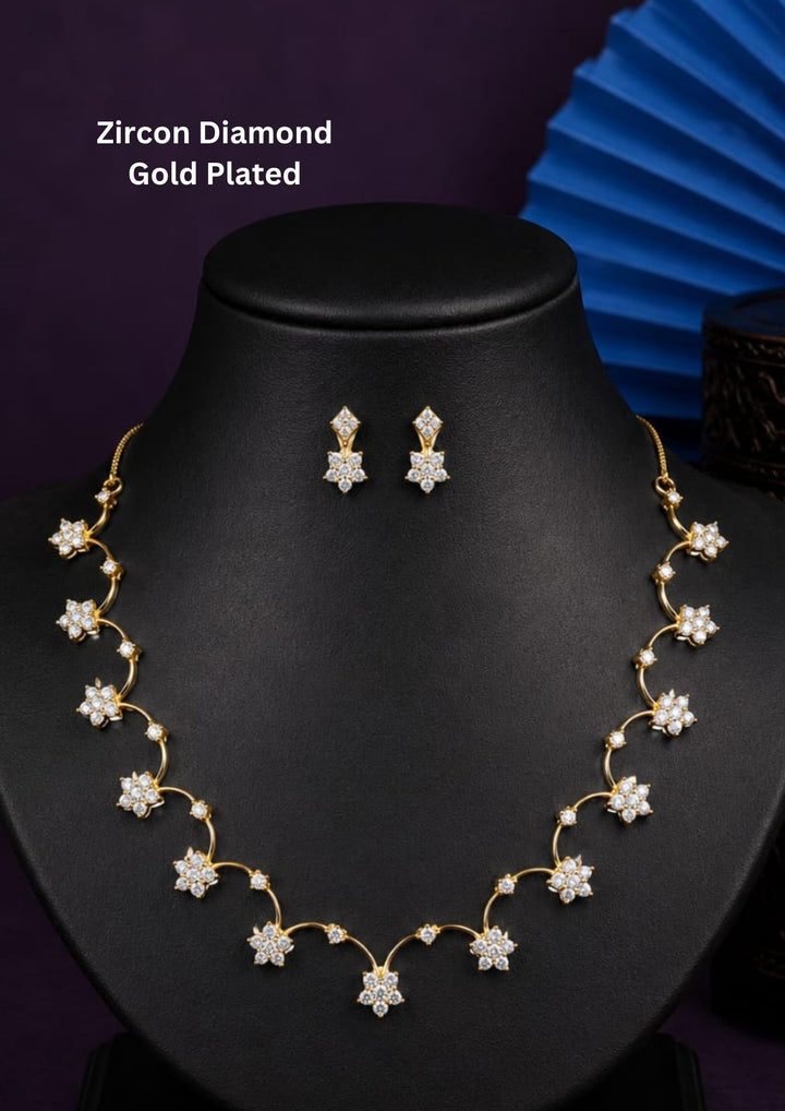 Premium gold plated zircon diamond necklace featuring elegant floral motifs with sparkling CZ stones and matching designer earrings.