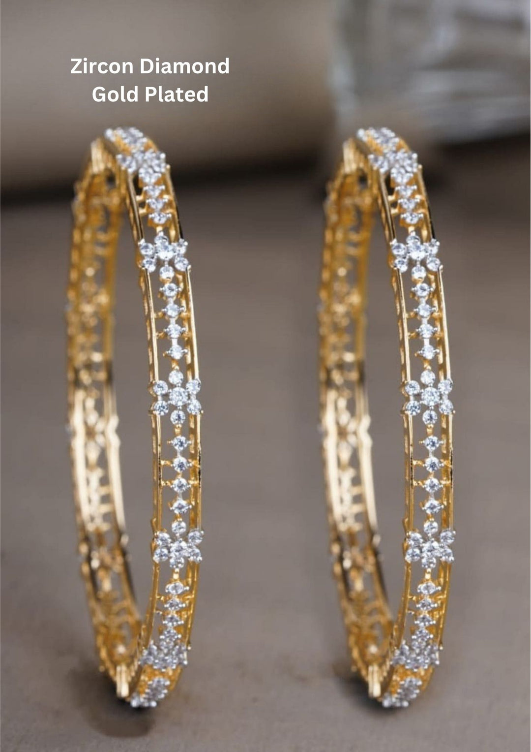 Elegant 18K gold plated zircon diamond bangles crafted with brilliant floral crystal detailing for festive and party wear.