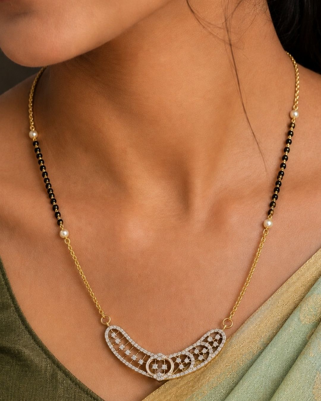 Beautiful black beads gold plated necklace set featuring a unique curved pendant embellished with sparkling stones and matching oval earrings, perfect for daily wear, festive occasions, parties, and gifting.