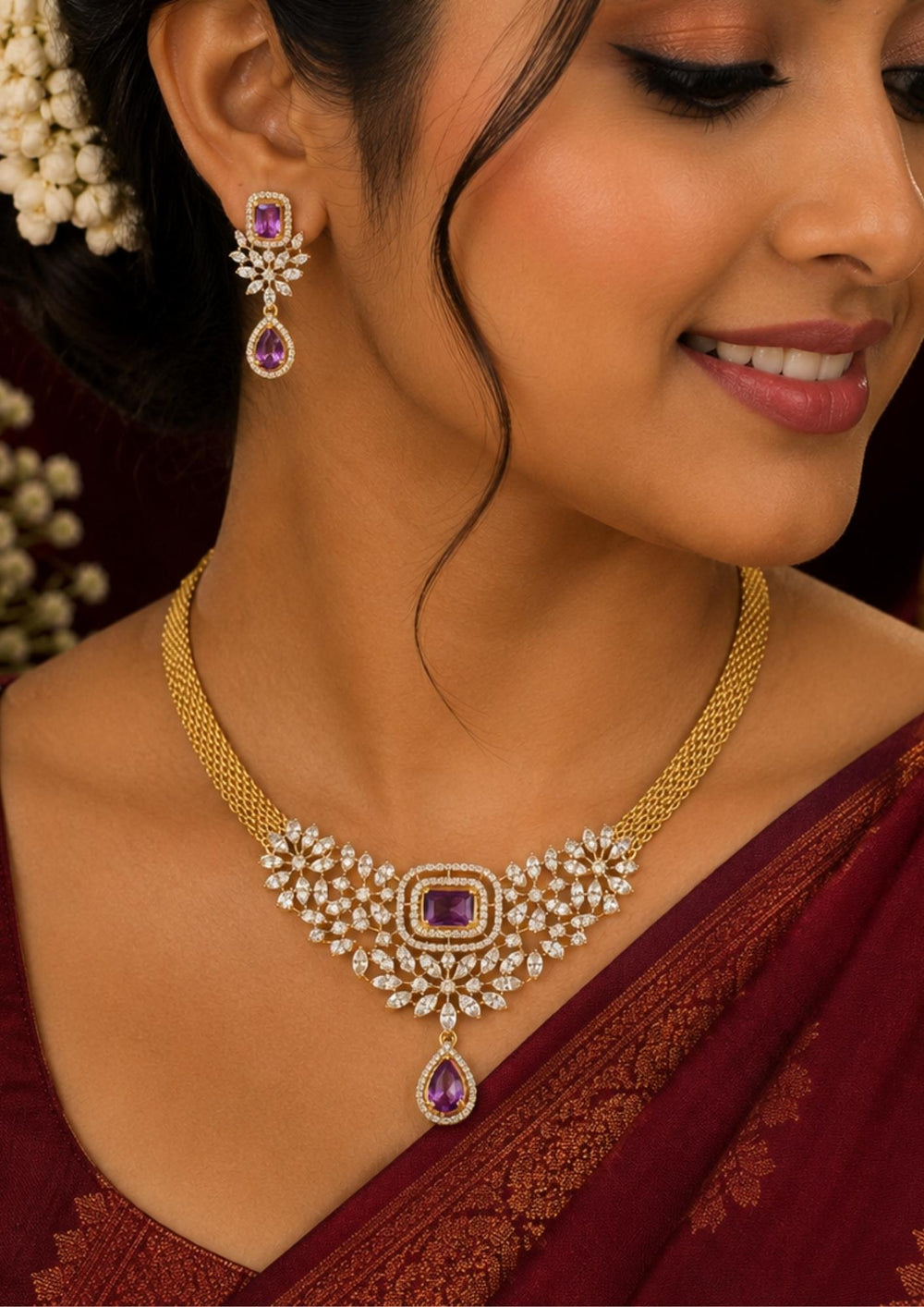 South Indian Women wearing a Designer purple zircon diamond necklace set with matching drop earrings, crafted with brilliant diamond-look stones and vibrant purple gemstones. Perfect for sarees, gowns, lehengas and festive celebrations.