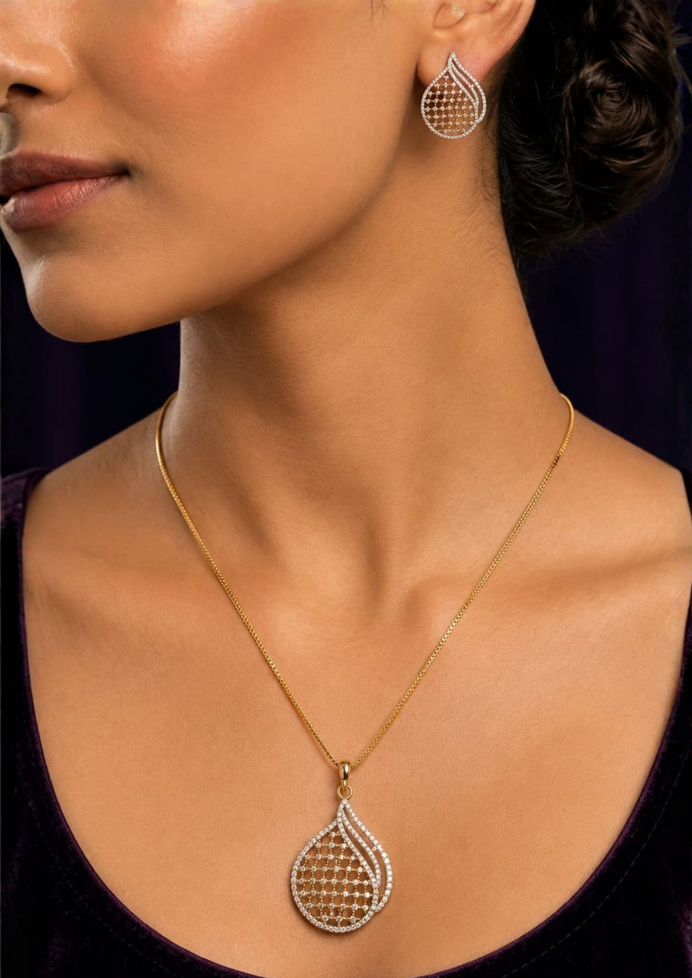 South indian women's Lightweight zircon diamond jewelry set with a gold plated chain, matching teardrop earrings, and a modern geometric lattice pattern for elegant occasions.