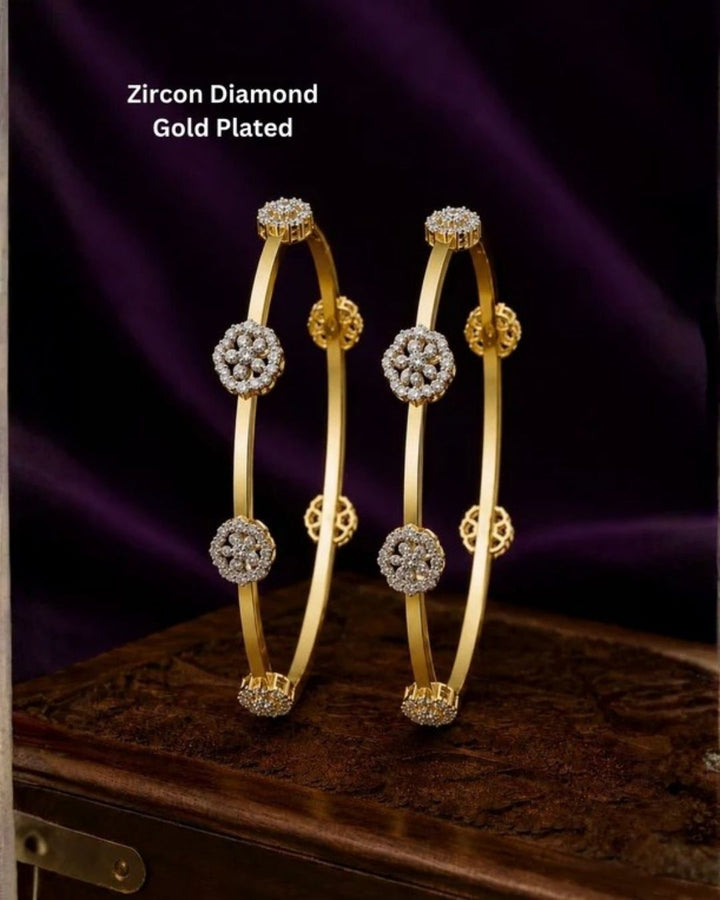 Premium zircon diamond gold plated bangles with delicate floral detailing and a polished finish, perfect for weddings, celebrations, and special occasions.
