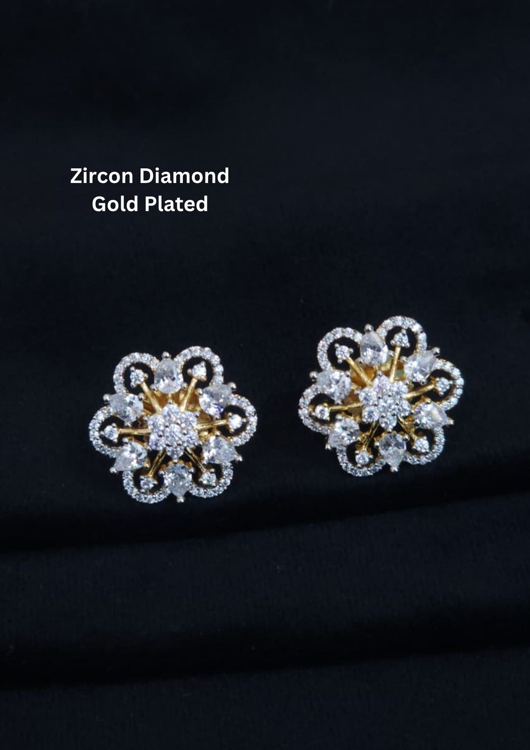 Elegant zircon diamond gold plated floral stud earrings featuring sparkling pear-cut and round zircon stones arranged in a luxurious flower design. Perfect for daily wear, parties, and festive occasions.