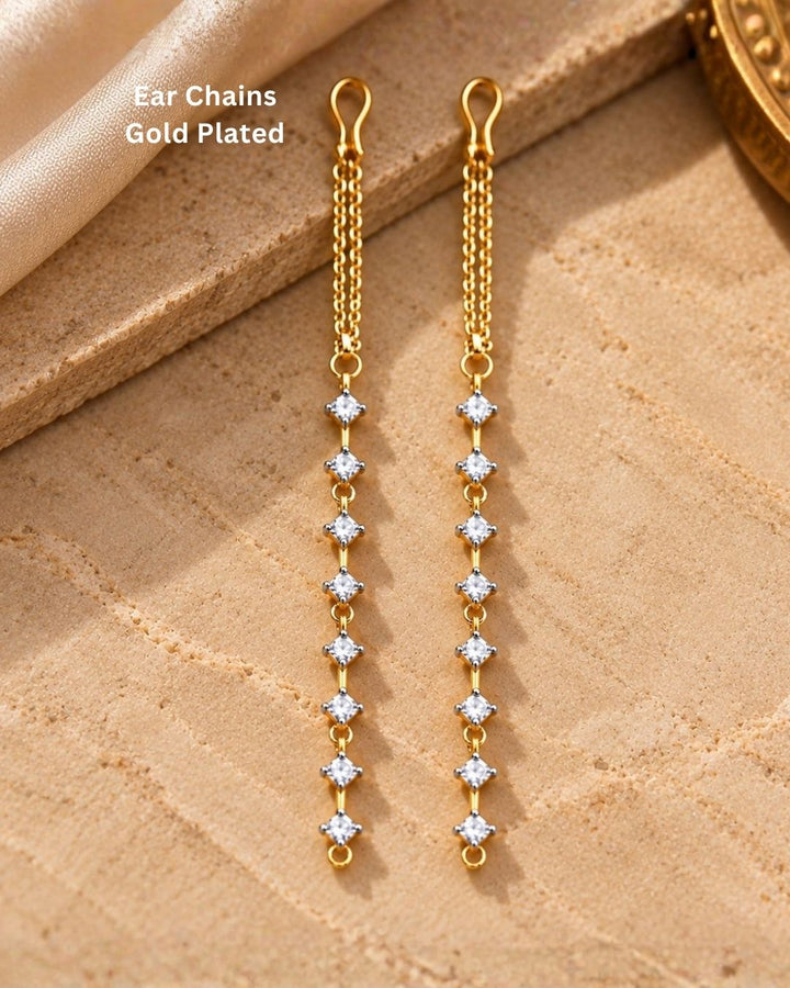 Gold plated designer ear chains featuring sparkling white square zircon stones arranged in a vertical pattern with delicate gold links.