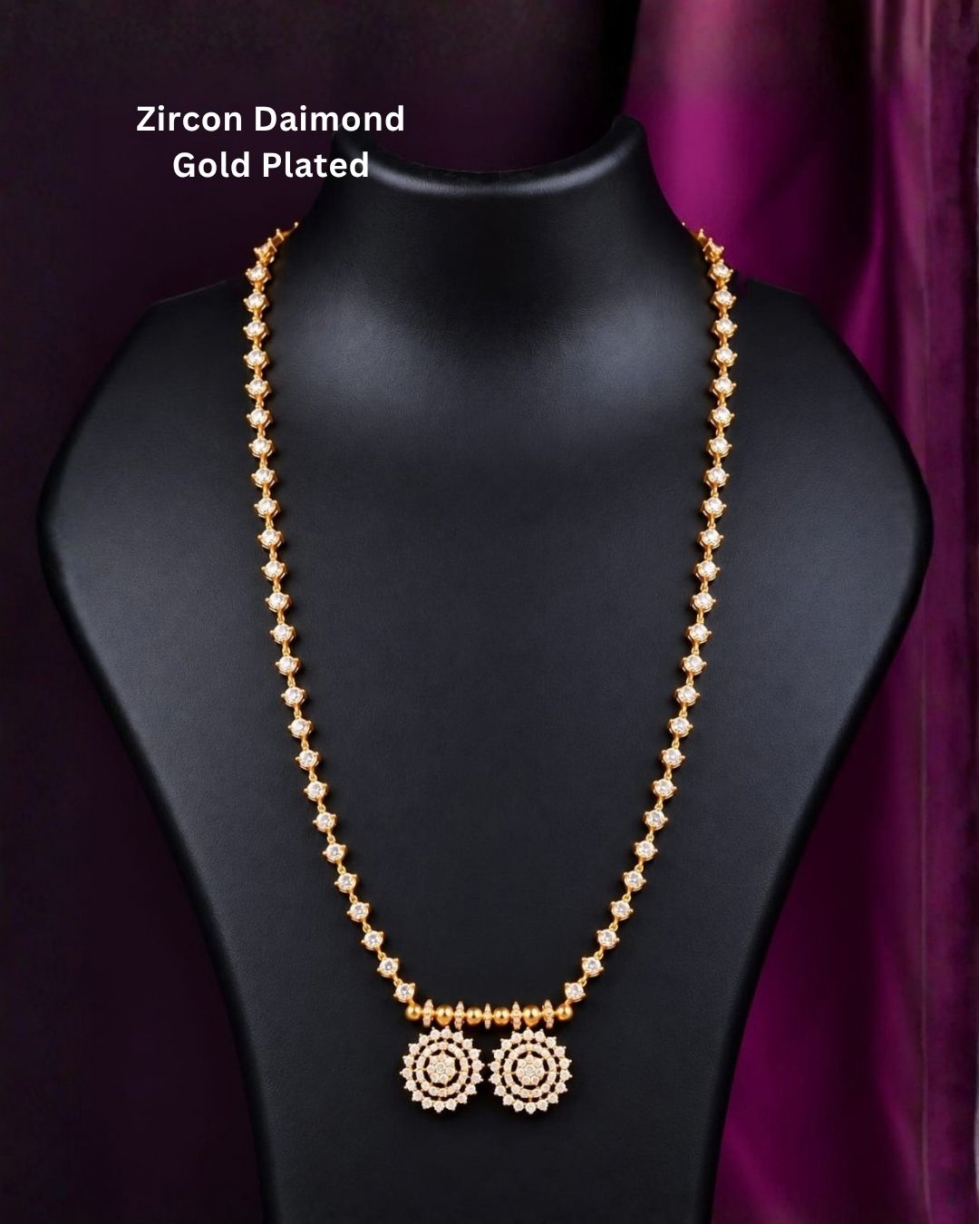 Gold plated designer mangalsutra arranged on a purple background, showcasing its delicate chain and twin round stone pendants.