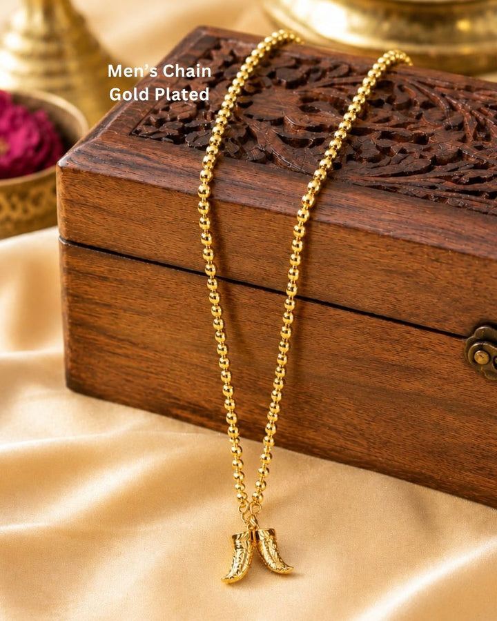 Beautiful gold plated necklace featuring a repeating beaded chain and a distinctive pair of curved horn-shaped pendants at the center. Perfect for traditional wear, festive occasions, weddings, parties, daily wear, and gifting.